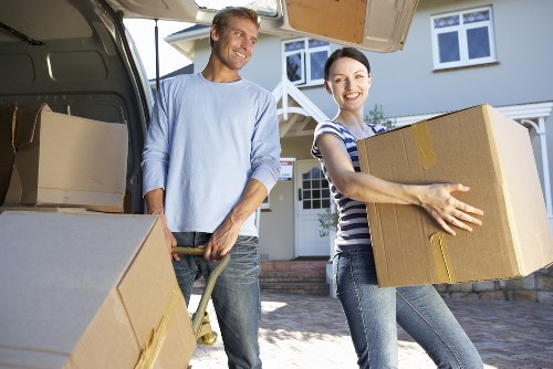 Customer interacting with an online removal truck hire booking interface