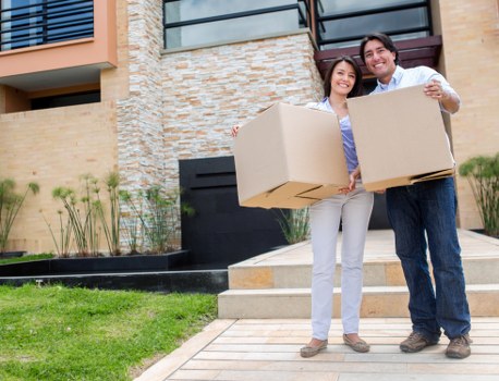 Professional movers handling furniture carefully in Finsbury Park